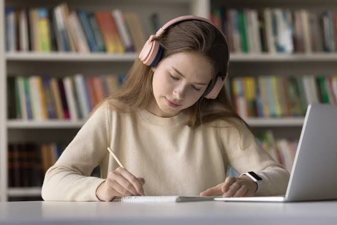 Young adults enjoy books, journaling and compact cameras as part of the analog living trend