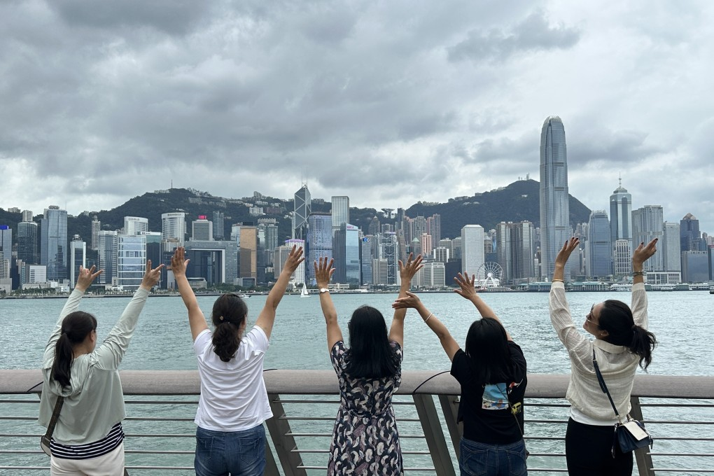 Hong Kong hiking landscape overlooking the coastline, islands and city skyline