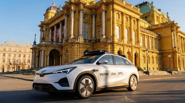 Autonomous electric robotaxi travelling through a European city